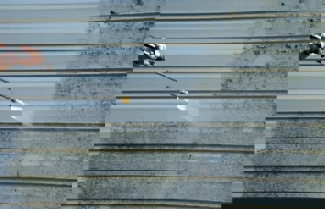 Pressure washing siding